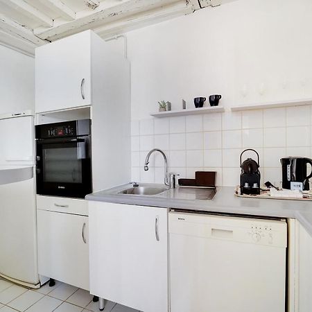 Guestready - Appartement Arty Cosy Et Tres Central Parigi Esterno foto