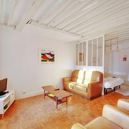 Guestready - Appartement Arty Cosy Et Tres Central Parigi Esterno foto